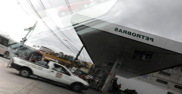 FILE PHOTO: A Petrobras gas station is pictured reflected in a car window in the outskirts of