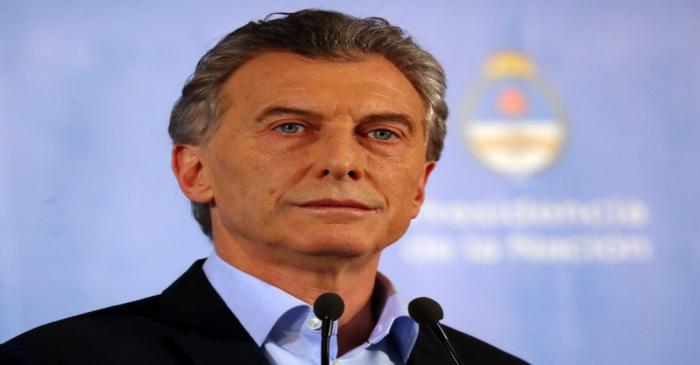 Argentina’s President Macri pauses during a news conference at the Olivos Presidential