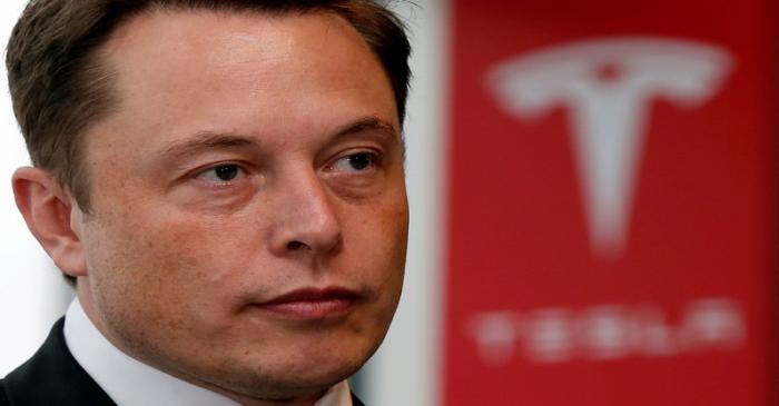 FILE PHOTO:  Tesla Motors Inc Chief Executive Elon Musk pauses during a news conference in