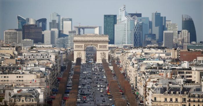 FILE PHOTO: General view of the skyline of La Defense business district behind Paris landmark