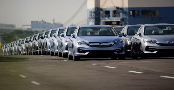 FILE PHOTO: Newly manufactured cars of the automobile maker Honda await export in a port in