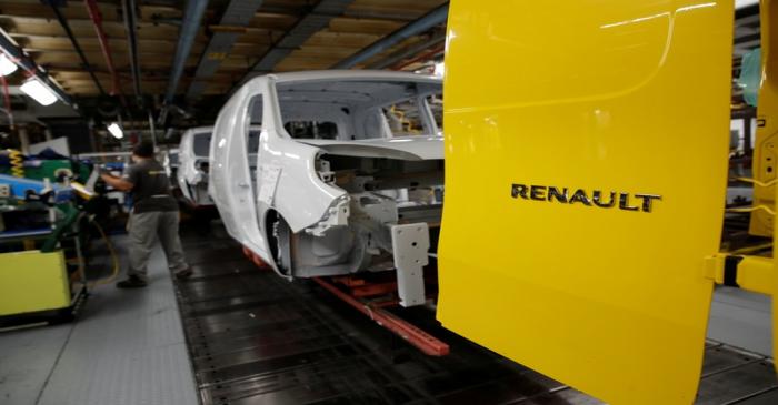 An employee works on the production and quality control line of the Renault Kangoo car at the