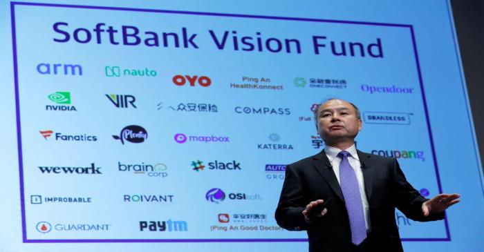 FILE PHOTO: Japan's SoftBank Group Corp Chief Executive Masayoshi Son attends a news conference