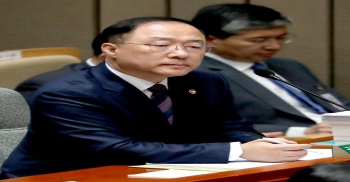 A nominee for South Korea's Finance Minister, Hong Nam-ki attends a meeting at the National