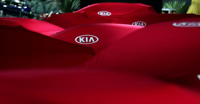 FILE PHOTO: Covered Kia cars are pictured during the Salao do Automovel International Auto Show