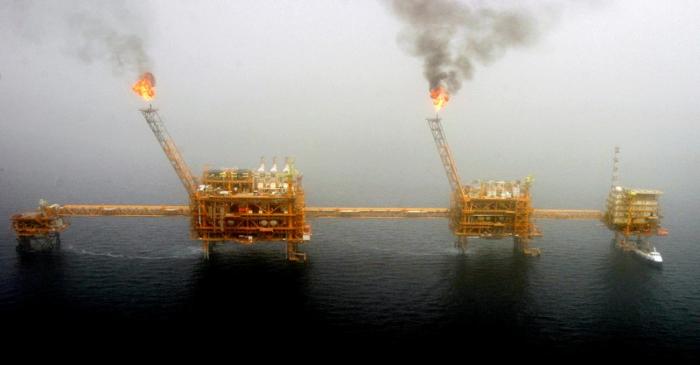 FILE PHOTO: Gas flares from an oil production platform are seen at the Soroush oilfields in the