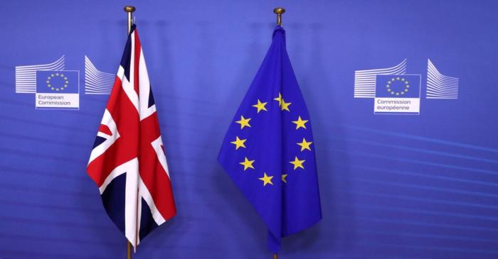 FILE PHOTO:  British and EU flags are seen before Britain's Prime Minister Theresa May meets