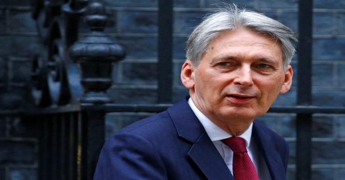 Britain's Chancellor of the Exchequer Philip Hammond leaves Downing Street in London