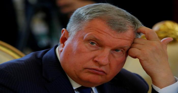 FILE PHOTO: Rosneft CEO Sechin attends the talks of Russian President Putin with South Korean