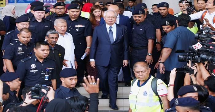 FILE PHOTO:  Malaysia's former Prime Minister Najib Razak leaves a court in Kuala Lumpur