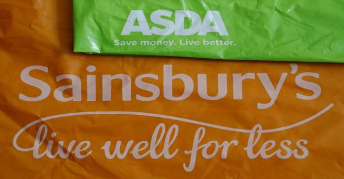 FILE PHOTO: Shopping bags from Asda and Sainsbury's are seen in Manchester.