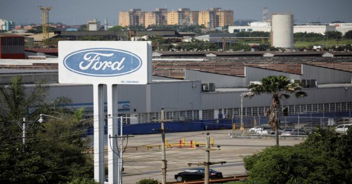 FILE PHOTO: The corporate logo of Ford is seen on a billboard at the facilities of the company