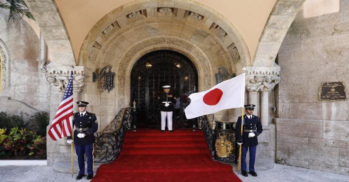 U.S. Marines stand guard at the front door of President Trump’s Mar-a-Lago estate awaiting