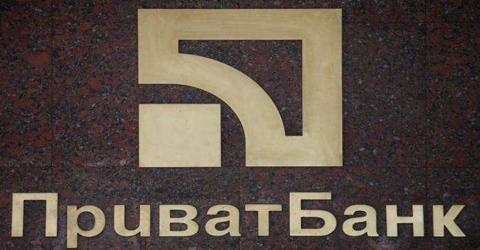 FILE PHOTO: The logo of PrivatBank is pictured outside its branch in Kiev