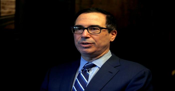 FILE PHOTO: U.S. Treasury Secretary Mnuchin speaks during his interview with Reuters in