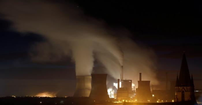 FILE PHOTO: Smoke and steam billows from the Emile Huchet Power Station operated by UNIPER in