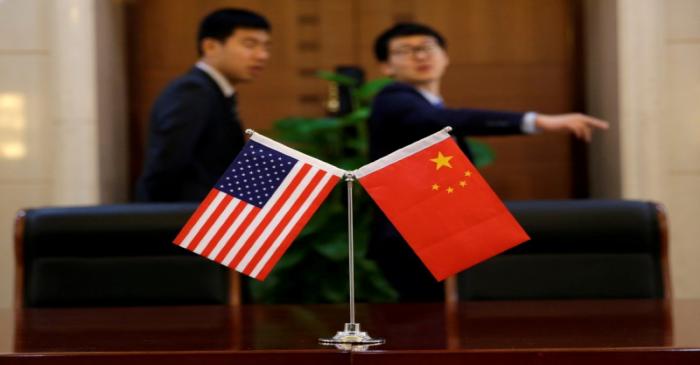 FILE PHOTO: Chinese and U.S. flags are set up for a signing ceremony during a visit by U.S.