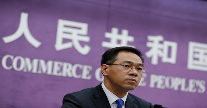 FILE PHOTO:  China's Ministry of Commerce spokesperson Gao Feng attends a news conference at