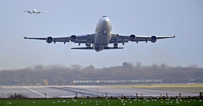 An airplane takes off at Gatwick Airport, after the airport reopened to flights following its