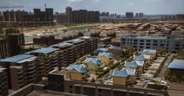 Houses, which have been built atop a furniture shopping mall, are pictured in Hengyang