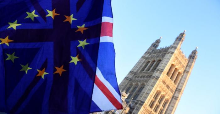 FILE PHOTO:  British and EU flags flutter outside the Houses of Parliament in London