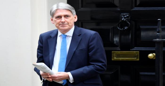 Britain's Chancellor of the Exchequer Philip Hammond leaves Downing Street in London