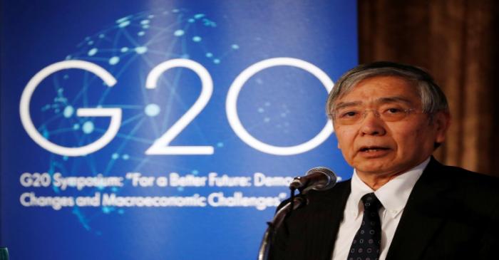 Bank of Japan Governor Haruhiko Kuroda delivers a keynote speech at a G20 symposium on