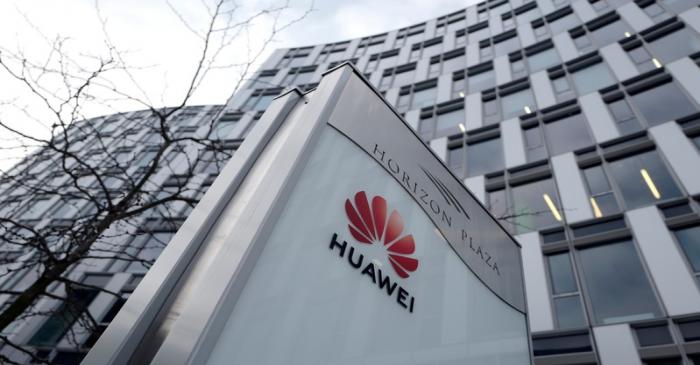 FILE PHOTO: Logo of Huawei is seen in front of the local offices of Huawei in Warsaw