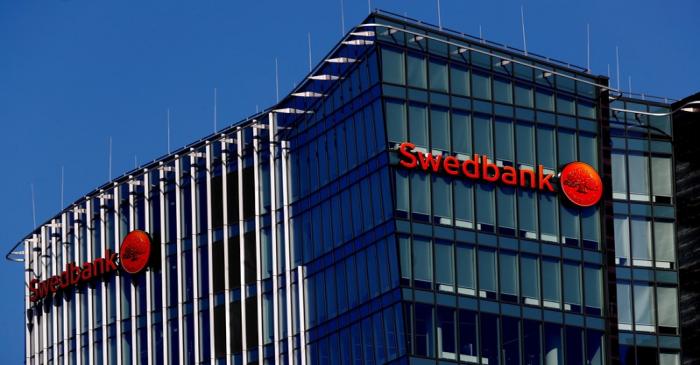 Swedbank signs are seen on a building in Vilnius