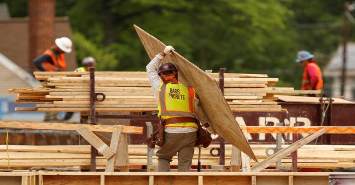 Construction workers are seen at a new building site in Silver Spring, Maryland