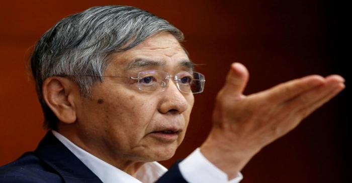 FILE PHOTO: BOJ Governor Kuroda attends a news conference at the BOJ headquarters in Tokyo