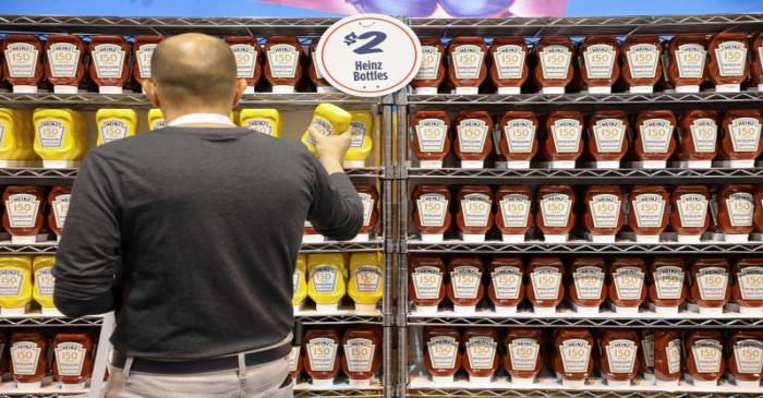 Shareholders shop for discounted products at the Kraft Heinz booth at the annual Berkshire