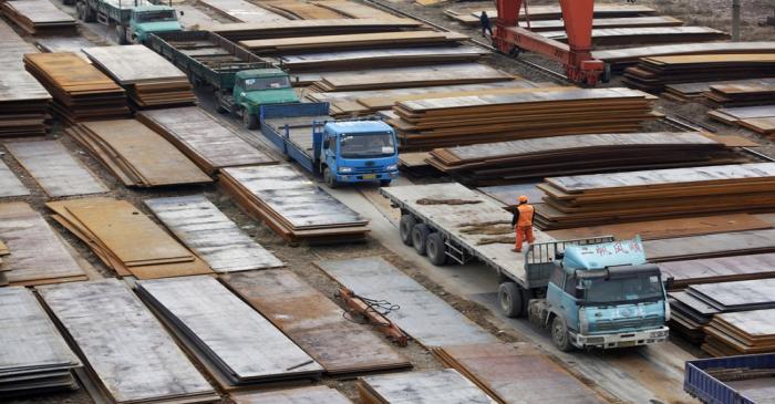 A labourer works at a steel market in Wuxi