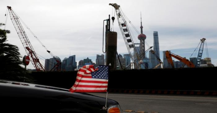 U.S. flag on an embassy car is seen outside a hotel in Shanghai