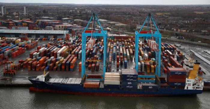 FILE PHOTO: A container ship is unloaded at Peel Ports Liverpool container terminal