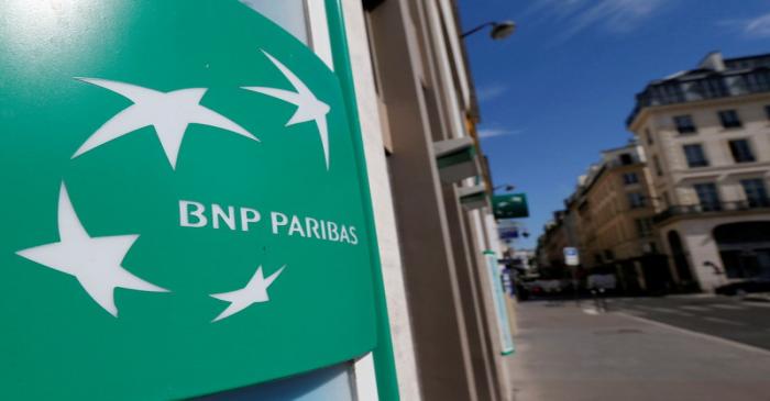 FILE PHOTO: A BNP Paribas logo is seen outside a bank office in Paris