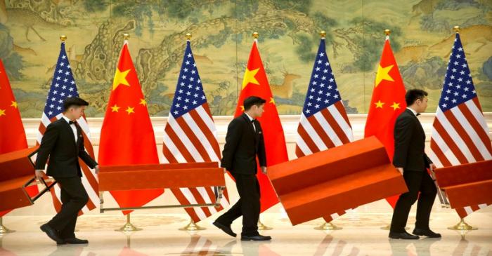 FILE PHOTO: FILE PHOTO: Aides set up platforms before a group photo with members of U.S. and