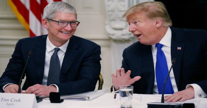 FILE PHOTO: Apple CEO Cook and U.S. President Trump participate in American Workforce Policy