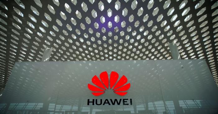 FILE PHOTO: A Huawei company logo at the Shenzhen International Airport