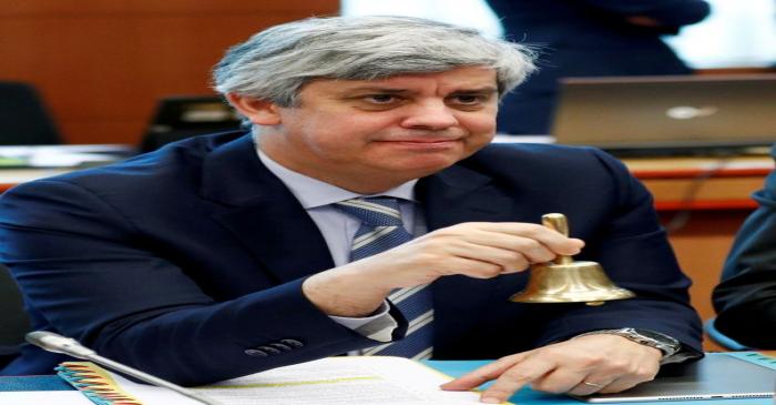 FILE PHOTO: Eurogroup President Centeno rings the bell at the start of a eurozone finance