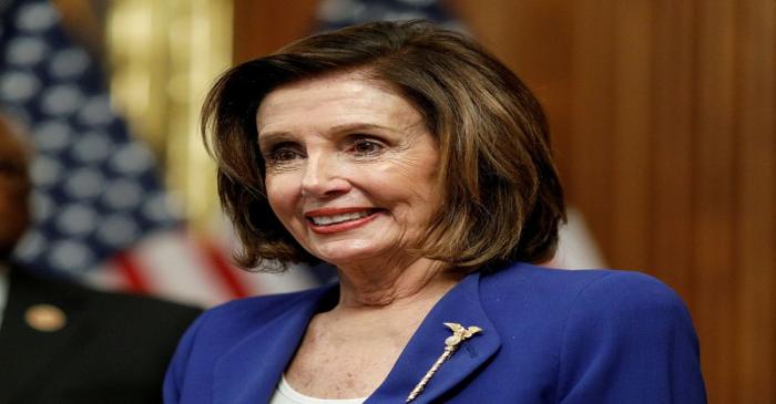 FILE PHOTO: House Speaker Pelosi holds coronavirus aid bill signing ceremony at the U.S.