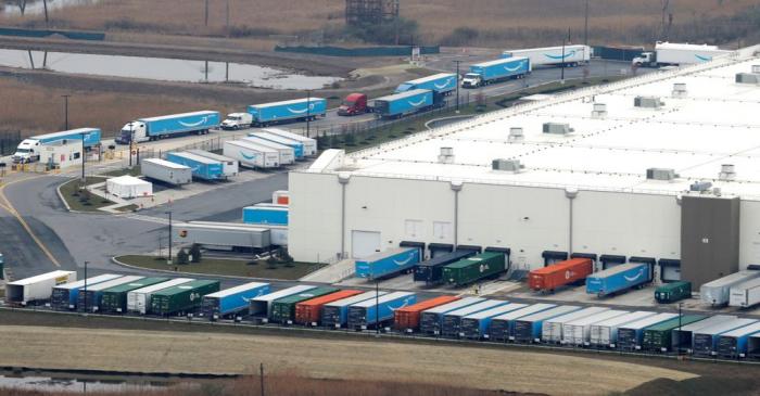 FILE PHOTO: Amazon.com trucks are seen at an Amazon warehouse in Staten Island in New York City