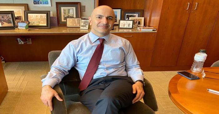 Minneapolis Federal Reserve Bank President Neel Kashkari poses during an interview with Reuters