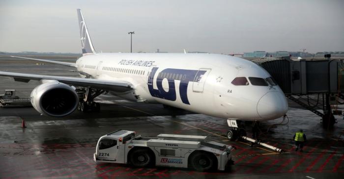 FILE PHOTO: A Boeing 787 Dreamliner jet operated by Polish airline LOT pictured through the