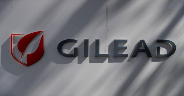 FILE PHOTO: A Gilead Sciences, Inc. logo is seen outside the company headquarters in Foster