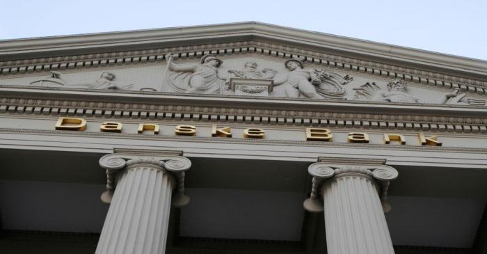 FILE PHOTO: A Danske bank signs are seen on a bank's headquarters in Copenhagen