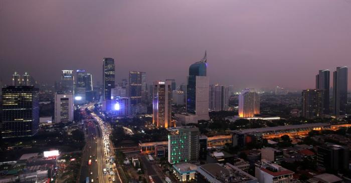 FILE PHOTO: General view of a business district during sunset in Jakarta