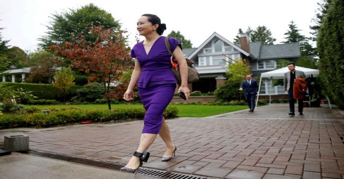 FILE PHOTO: Huawei Technologies Chief Financial Officer Meng Wanzhou leaves her home