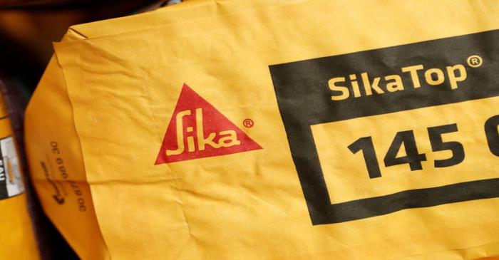 The Swiss chemical group Sika company logo is pictured on a bag of SikaTop in their training