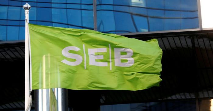 FILE PHOTO: SEB bank flag flutters next to the bank's building in Tallinn